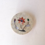 オレンジの丸いお花のケース