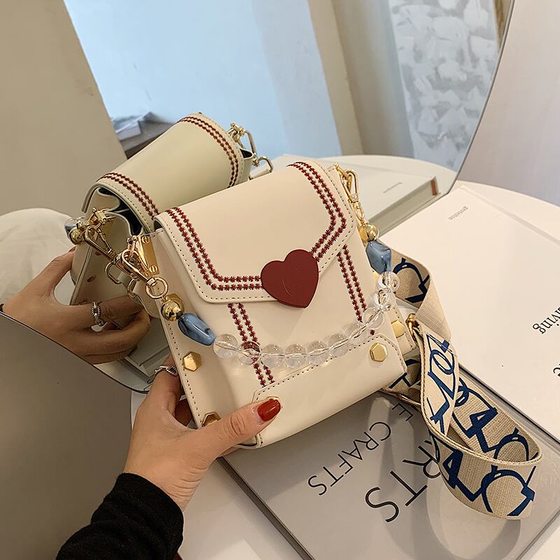 テクスチャードスモールバッグ女性2020夏の新しいトレンディなファッションワイルドワンショルダーメッセンジャーバッグネットセレブ人気チェーン携帯電話バッグ Tiancai_Wing_Bag8659304