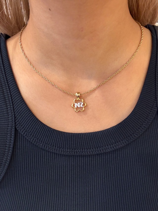 NINA RICCI / vintage flower motif logo necklace.