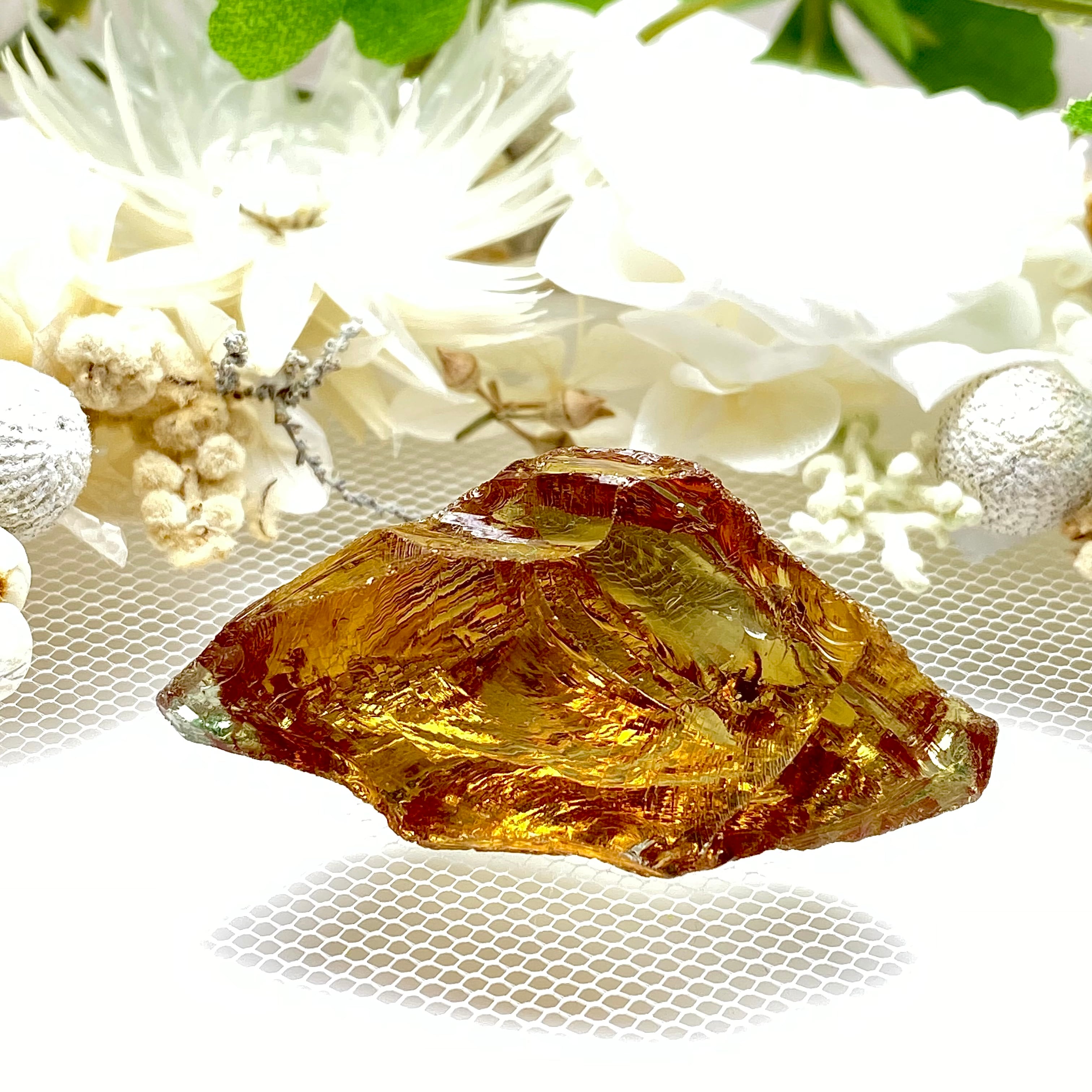 インドネシア産アンダラクリスタル原石 【カラーチェンジあり】 ミステリアスオレンジ C