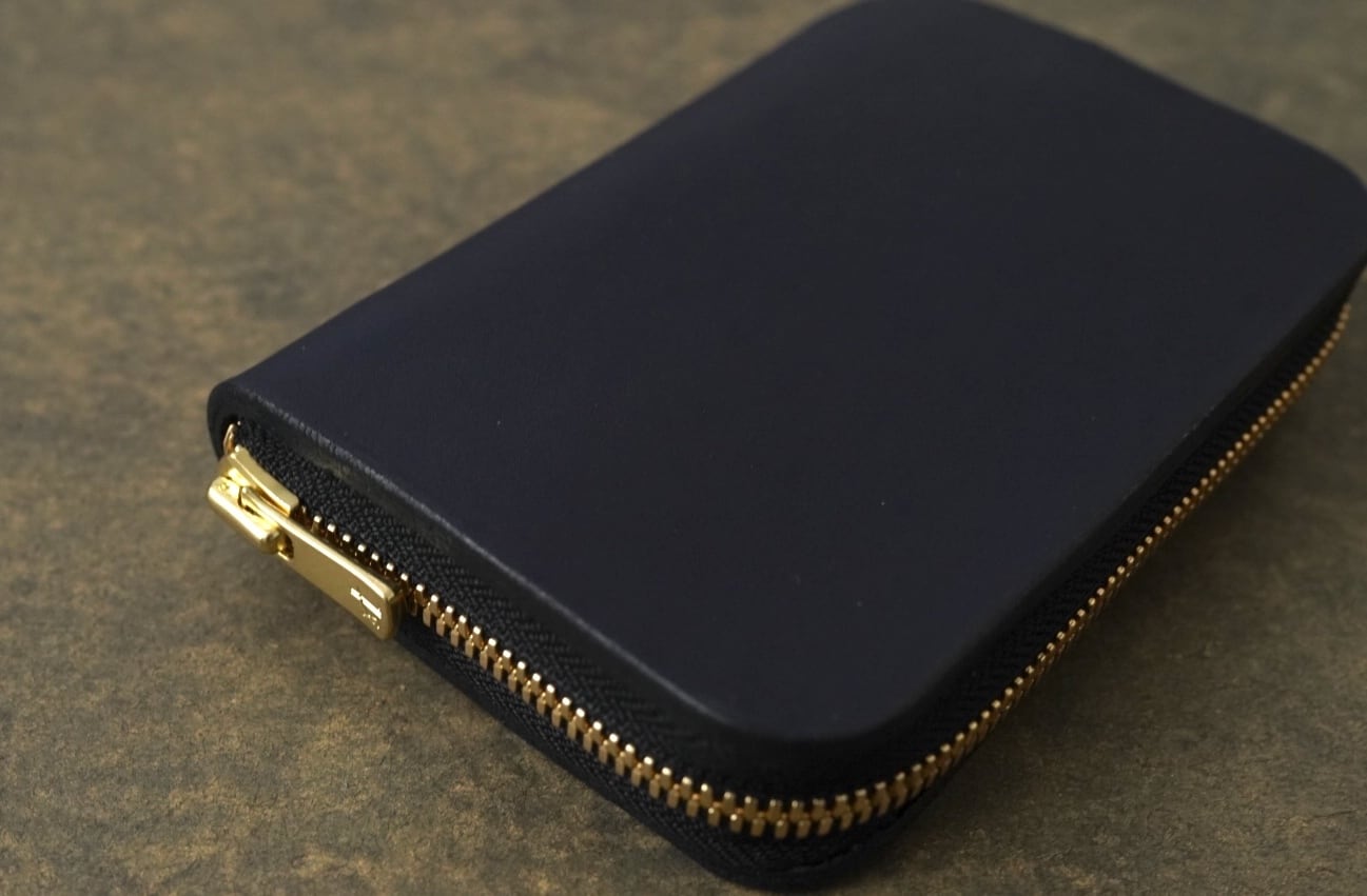 NAGI round zip wallet MID フランスヌメ ネイビー | una