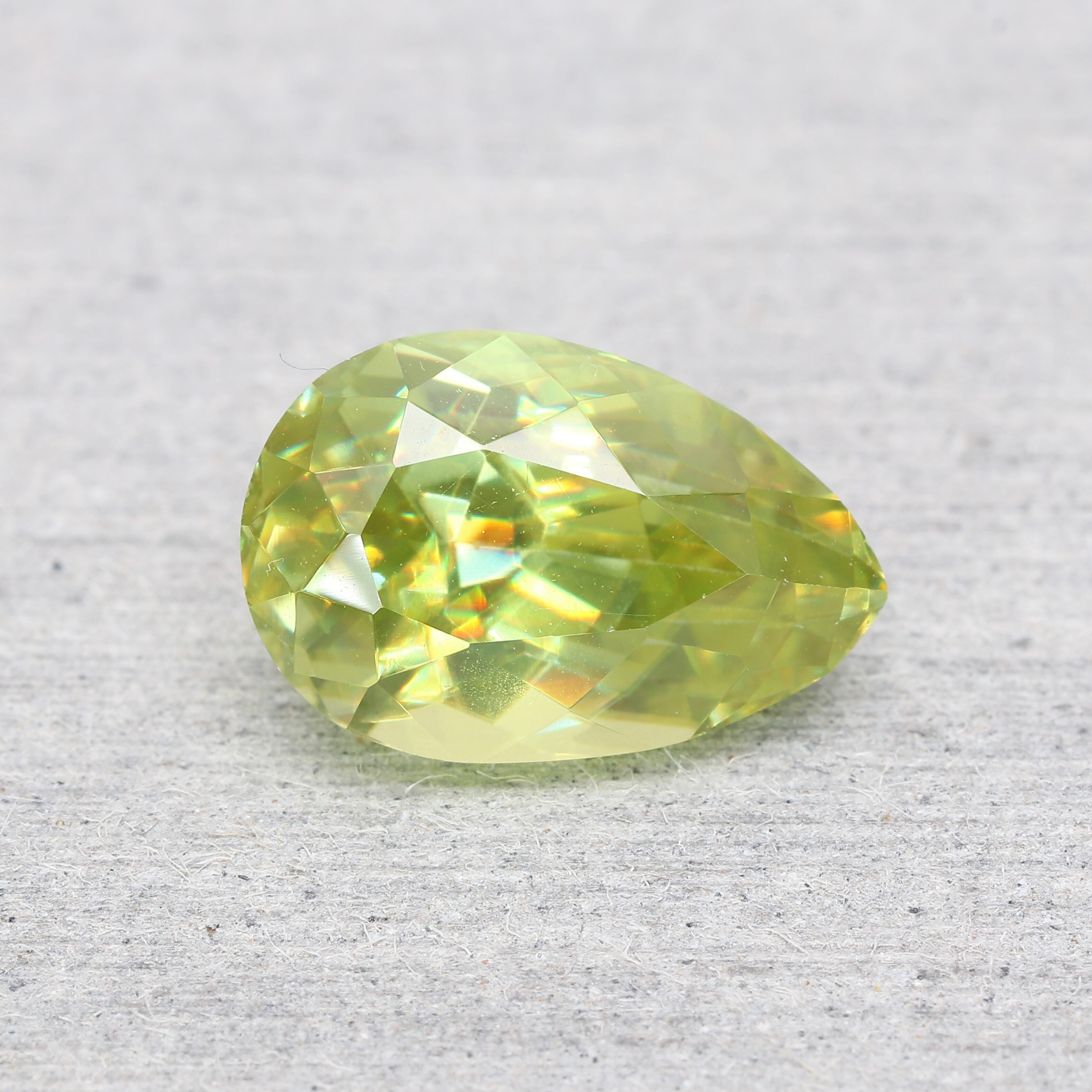 アンドラダイトガーネット トパゾライト 0.354ct クッション 日独ソ