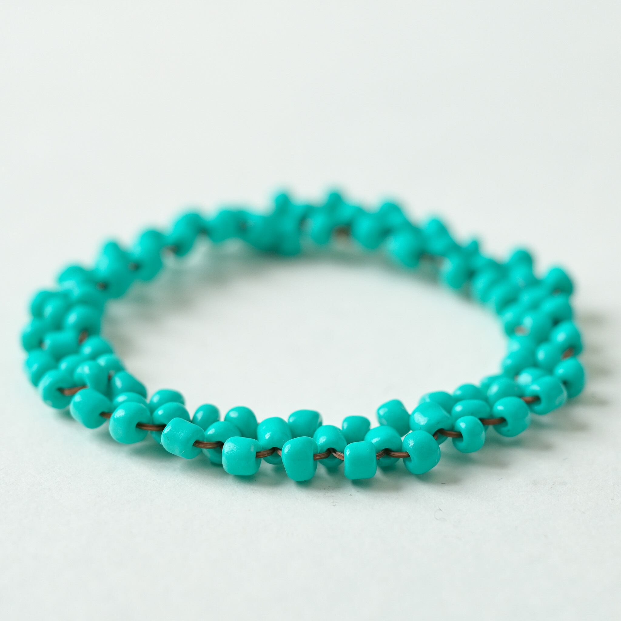 じょもこ　ターコイズ ビーズ刺繍 フレアドレス 中央アジアの町で出会った、ターコイズビーズのブレスレット