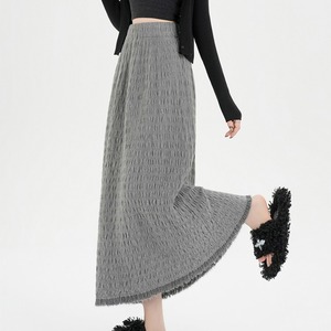 Pleated‑look knit A‑line midi skirt with fringe hem (SN299)