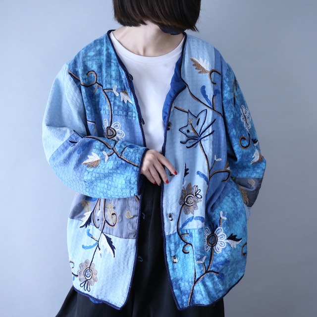 beautiful blue color flower embroidery design over silhouette gobelins jacket