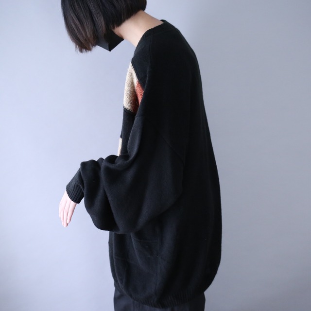 black base random block pattern over silhouette knit