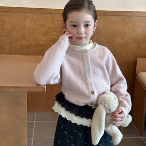 秋優しいピンクカーディガン