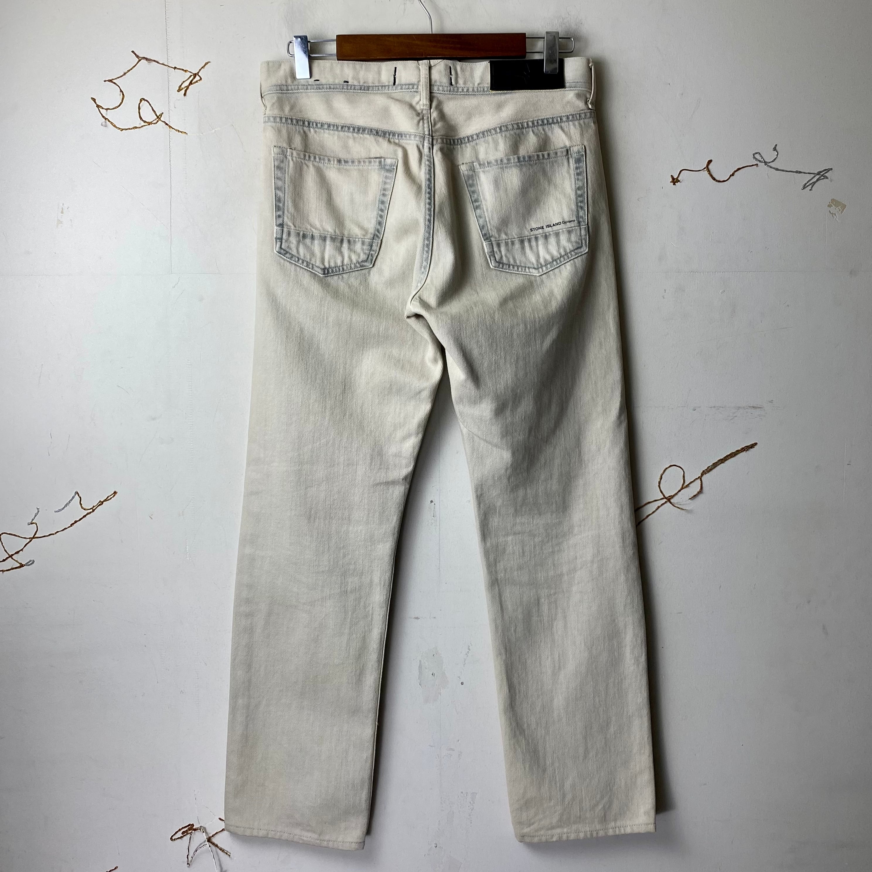 STONE ISLAND DENIMS bleach denim pants | NOIR ONLINE