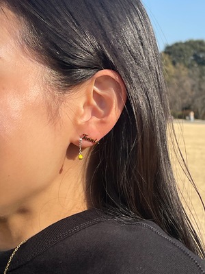 Mini tennis ball pierces