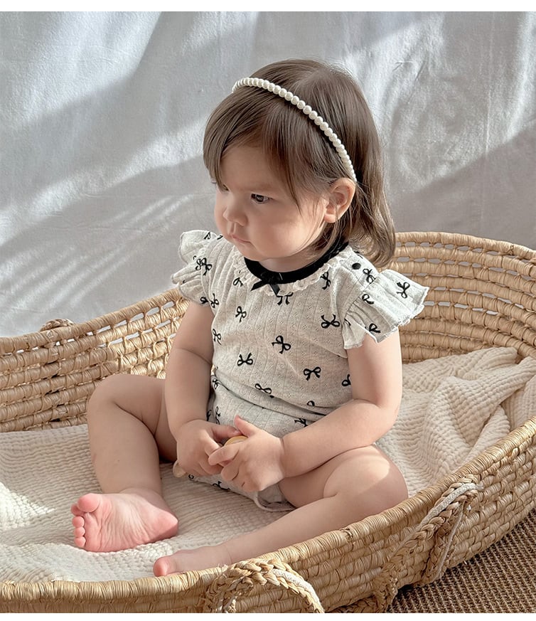 モノトーンリボンロンパース