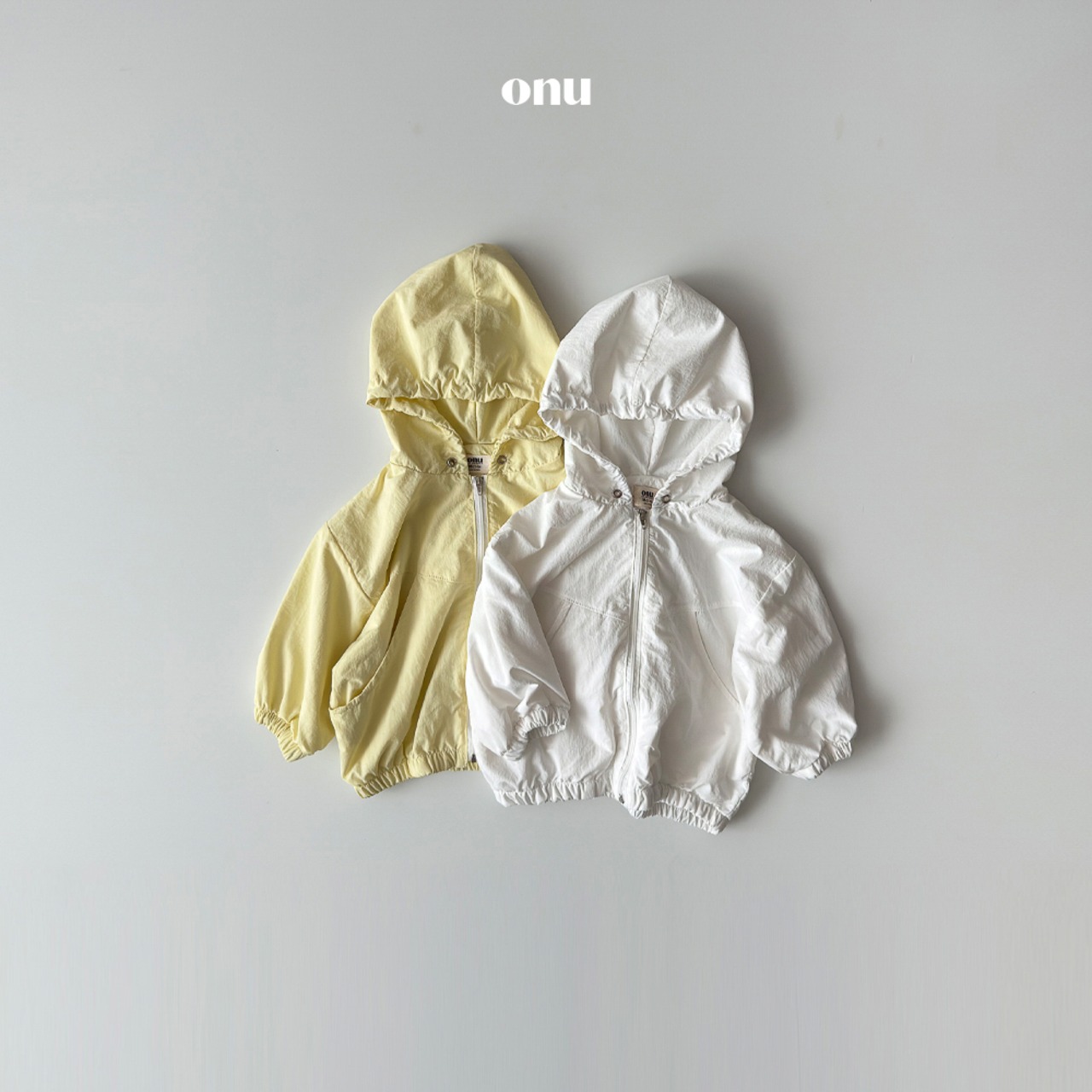 ONU 26/SS Hooded Panel Windbreaker