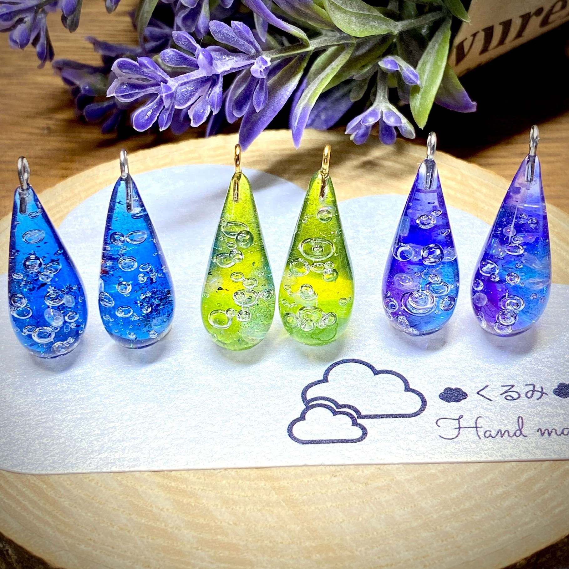 夏♥️軽量⭐️星砂入りのオーロラ水滴サーフボード型海レジンピアス