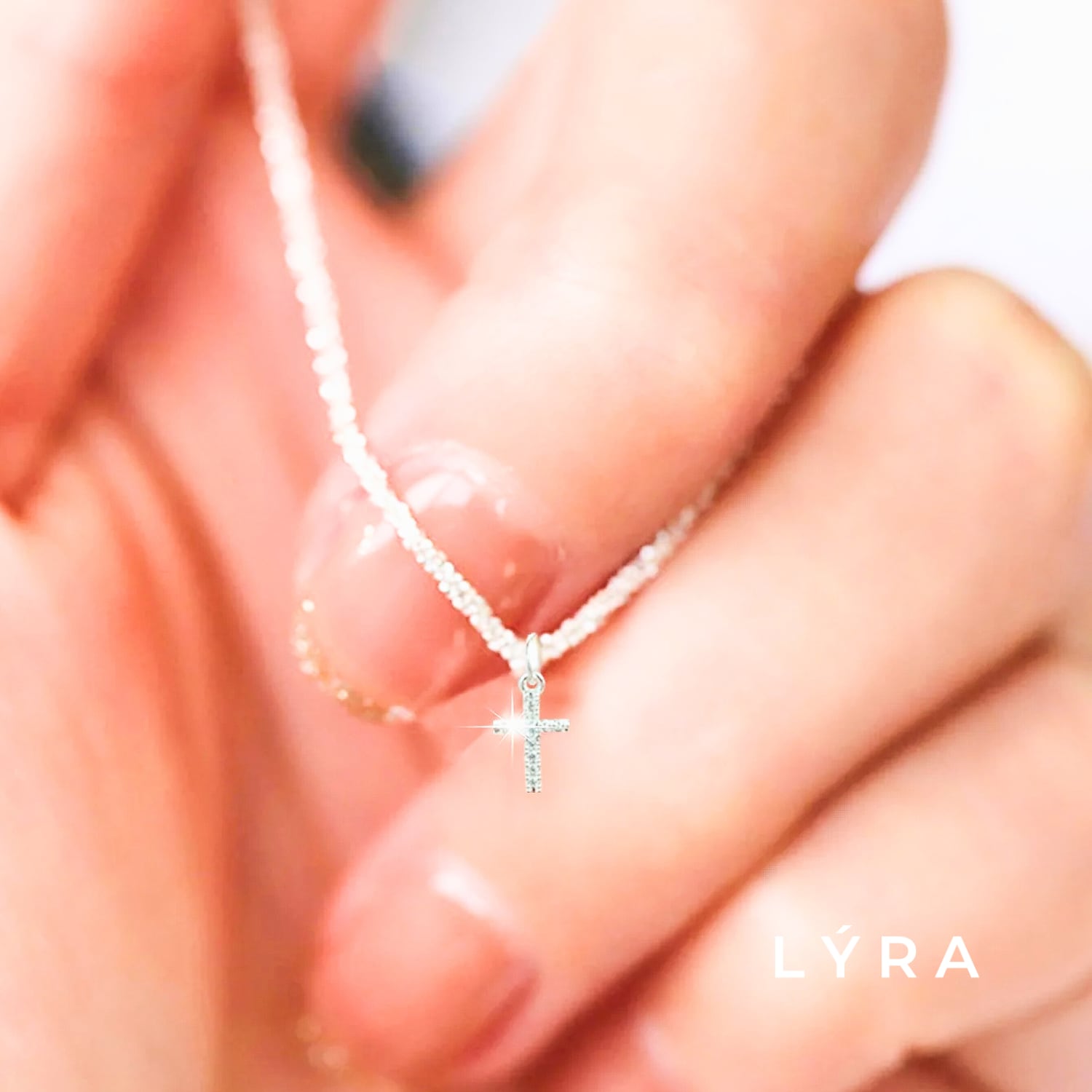 ダイヤモンドカットチェーンクロスネックレス | LYRA | 金属 ダイヤモンドカットチェーンクロスネックレス | LYRA | 金属