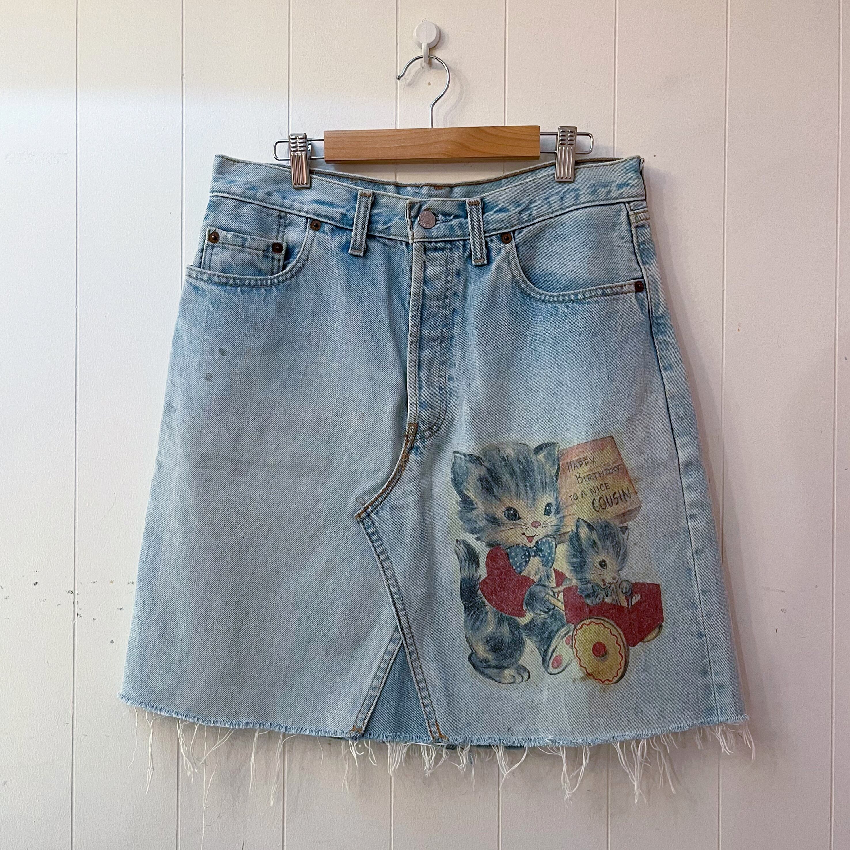 cat printed denim skirt
