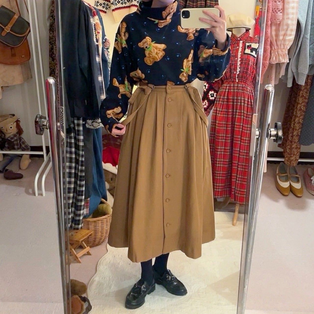 beige front button suspender skirt