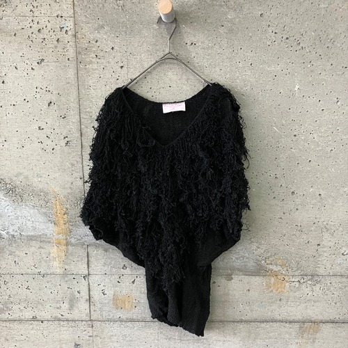 Made in U.S.A. knit with fringe