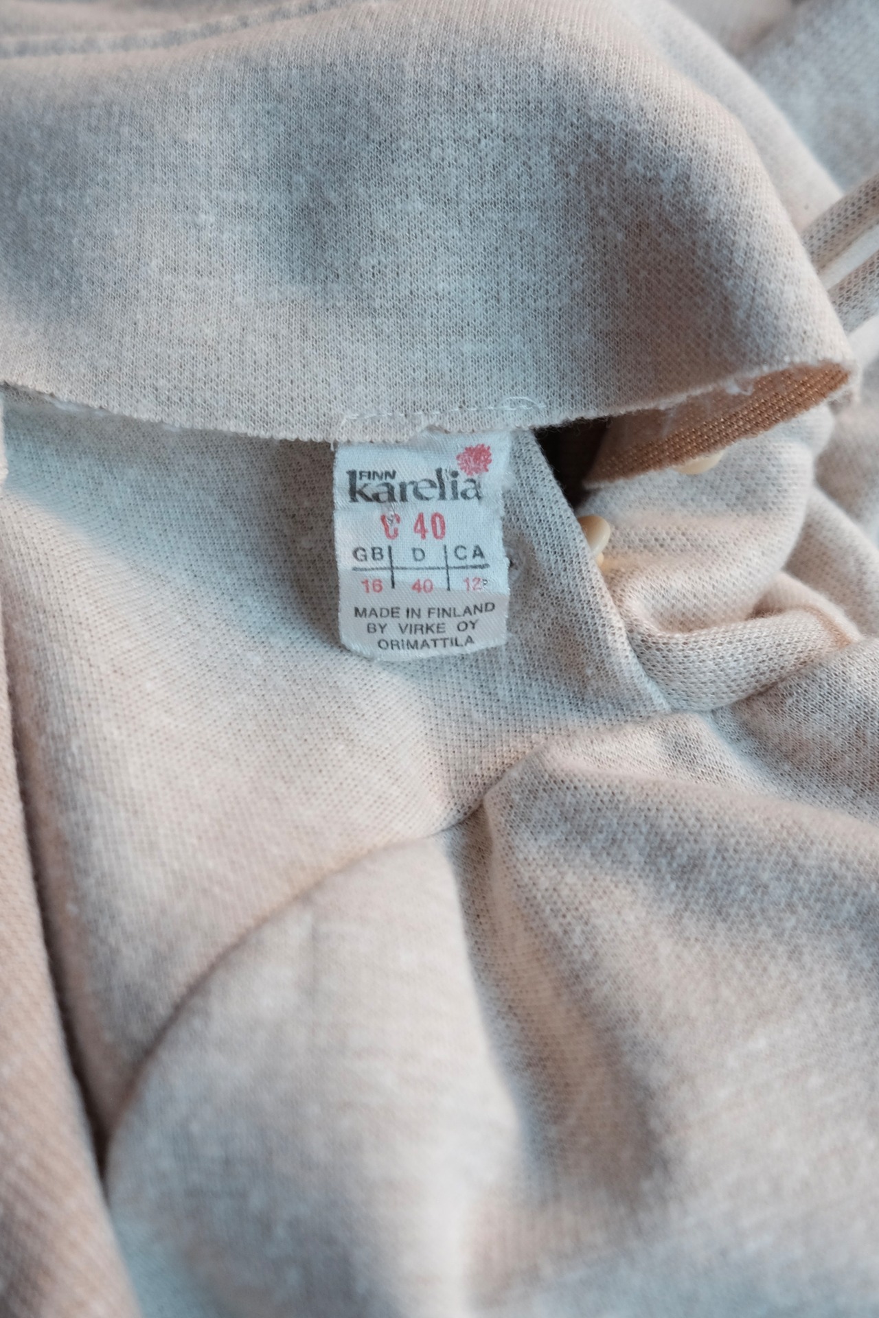 Neutral color asymmetric neck knit dress