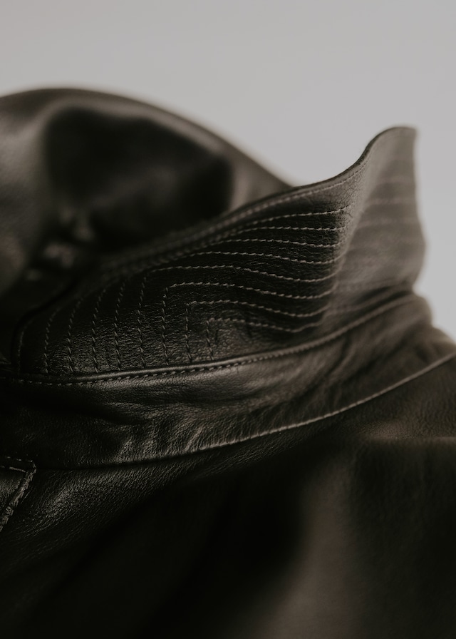 00's Salvatore Ferragamo single zip drizzle type leather jacket