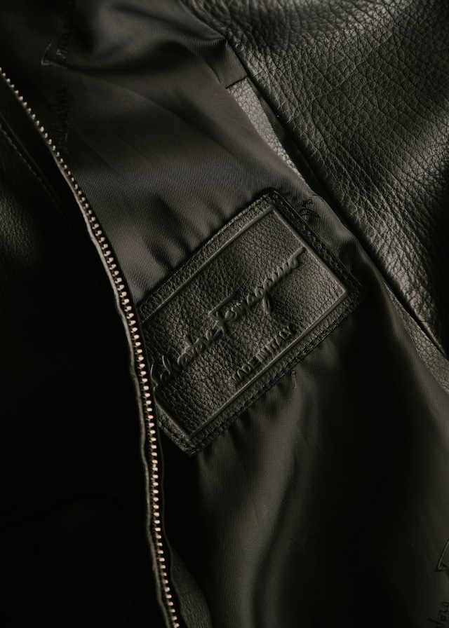 00's Salvatore Ferragamo single zip drizzle type leather jacket