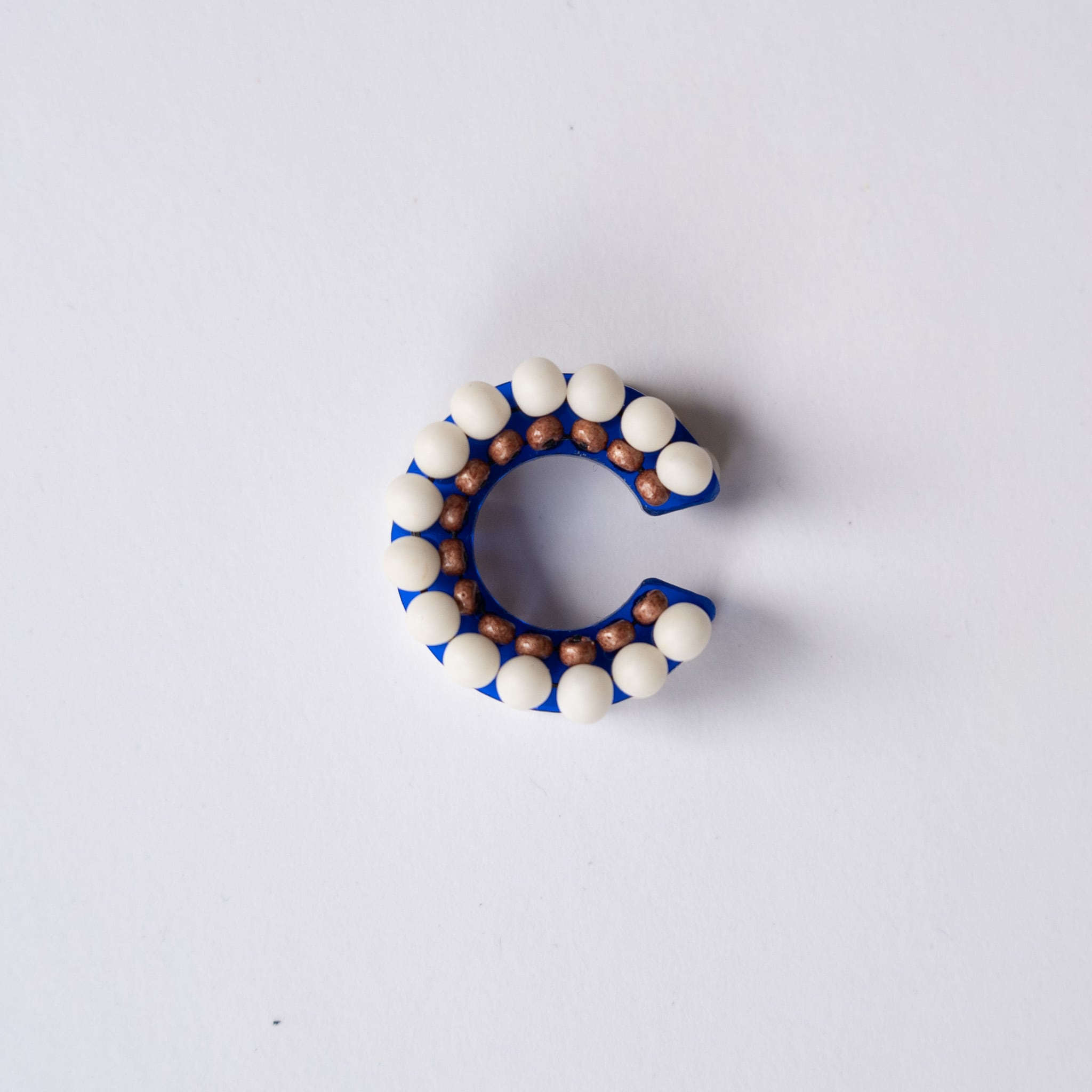 puzzle ring ear cuff [64]