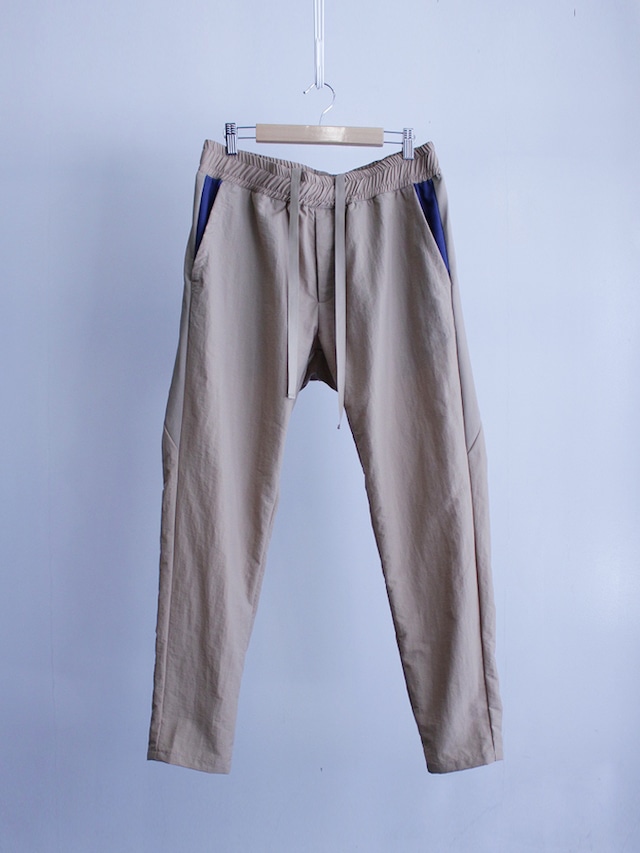 Garage.U.W STUNNER POPLIN BLADE TRACK PANTS BEIGE