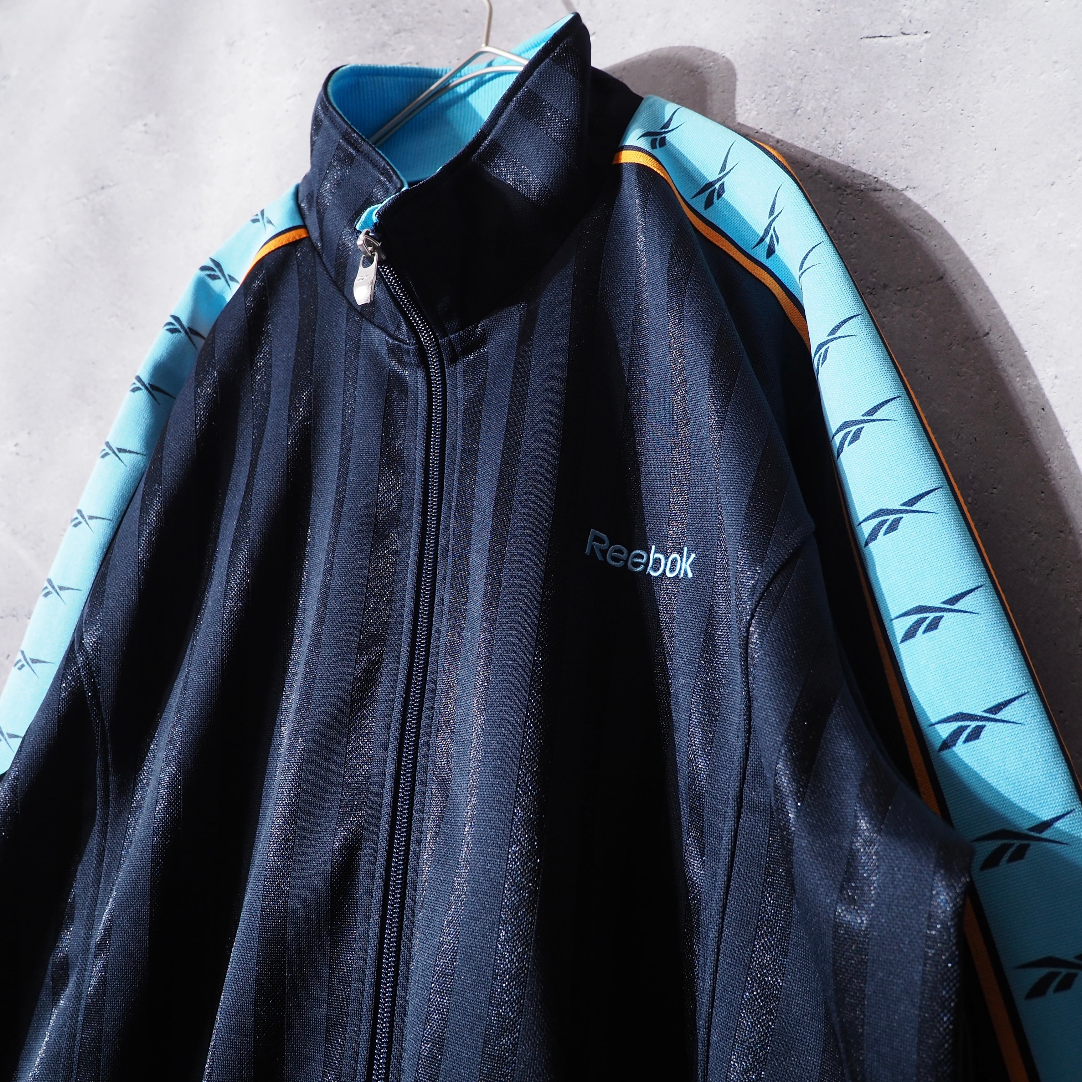 ” Reebok ” Good color line logo printed loose track jacket