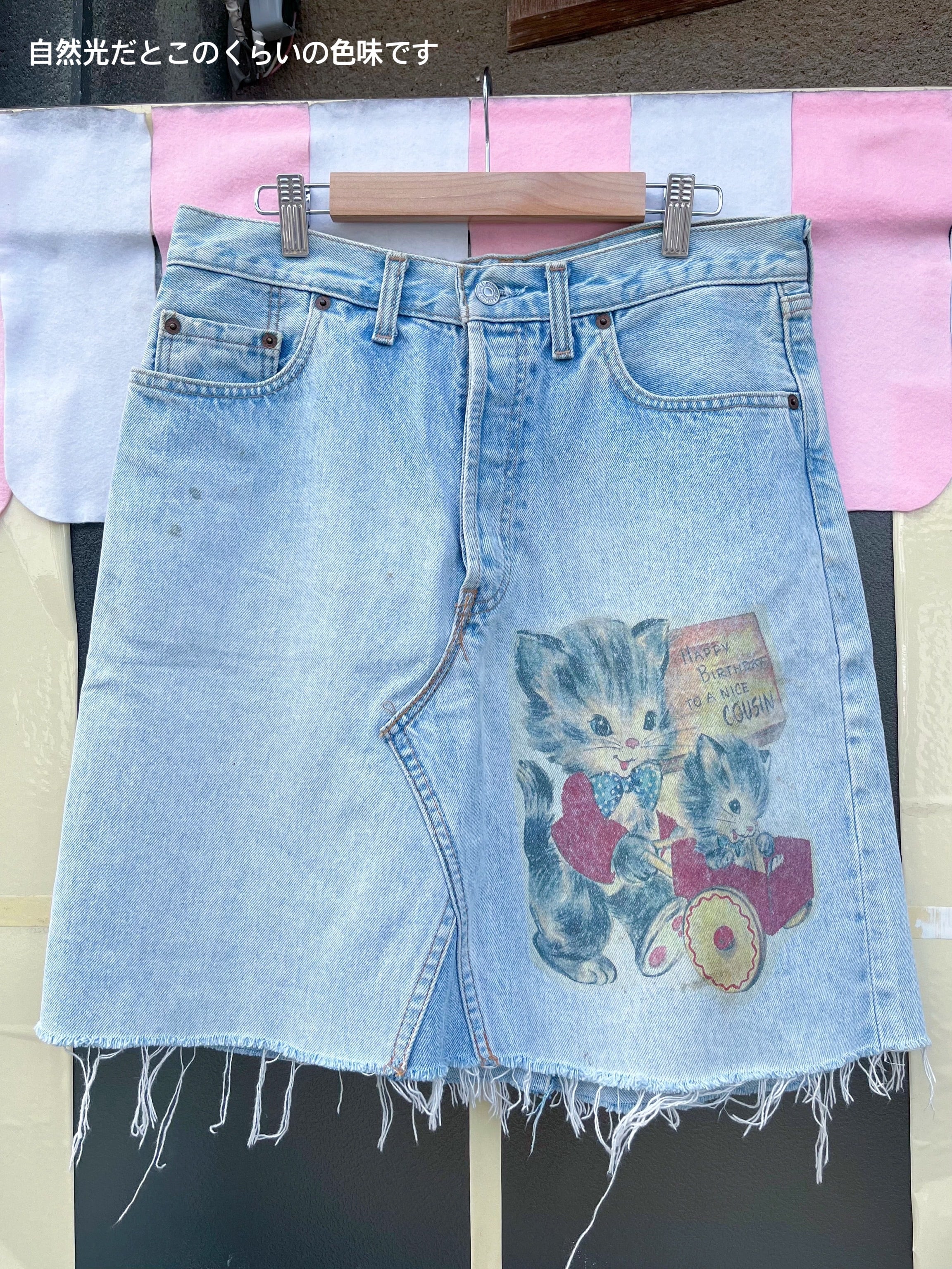 cat printed denim skirt