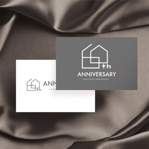 住宅を象徴としたモダンな60周年ロゴ