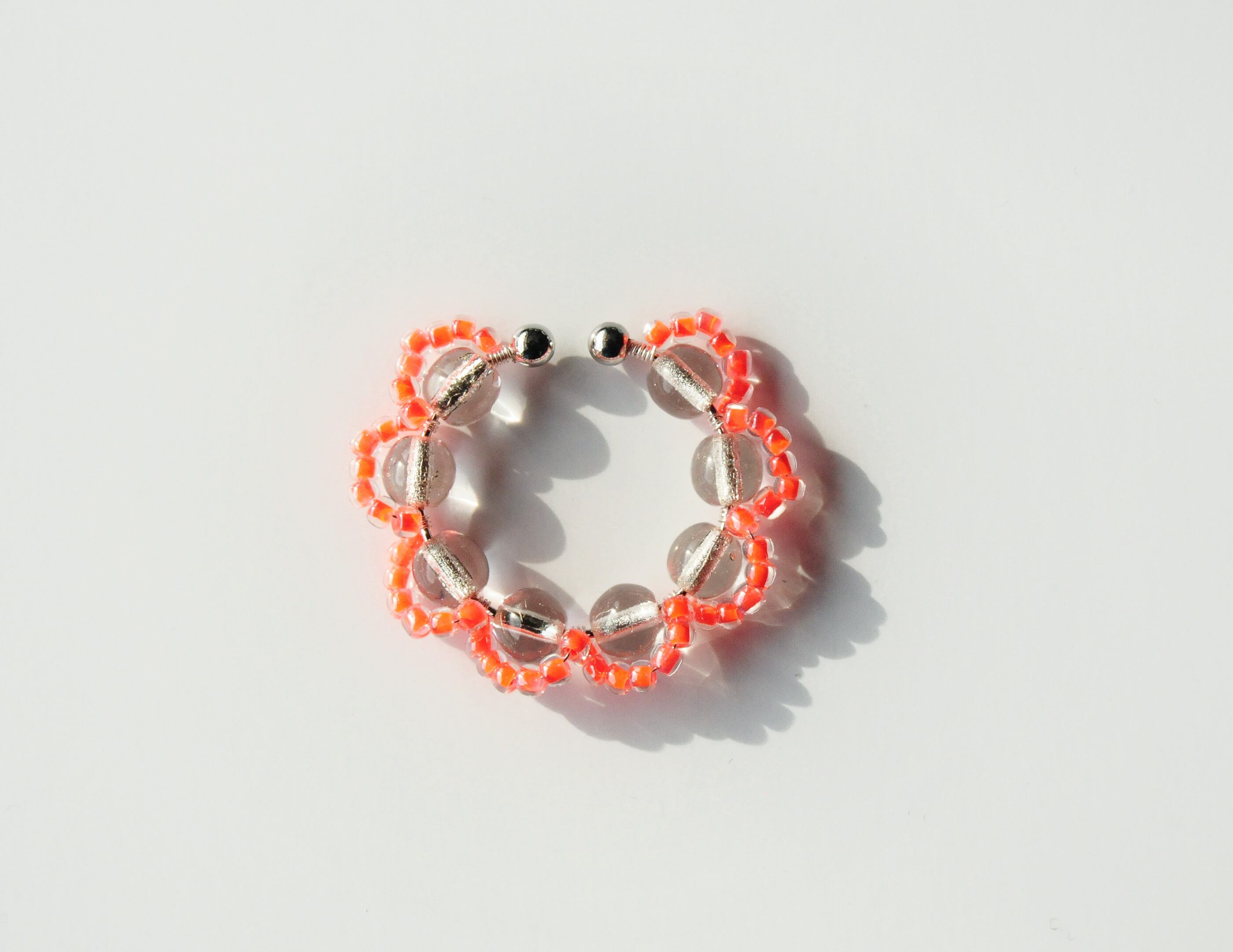 ＜Rollo～イロヅクビジュー～＞イヤーカフ『 Silver Line × Neon Orange 』