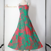 フラダンス 衣装 ワンピース ドレス グリーン系 マーメイドライン エムエムジェイ ハワイアンプリント アロハ MermaidLine MMJ フラ ダンス レッスン 練習 レッド系 緑 赤 フリル 着回し フレア キャミソールドレス オフショル 華やか 鮮やか かわいい おしゃれ 上品 おしゃれドレス リバーシブル フリル付き マーメイドライン グリーンレッド