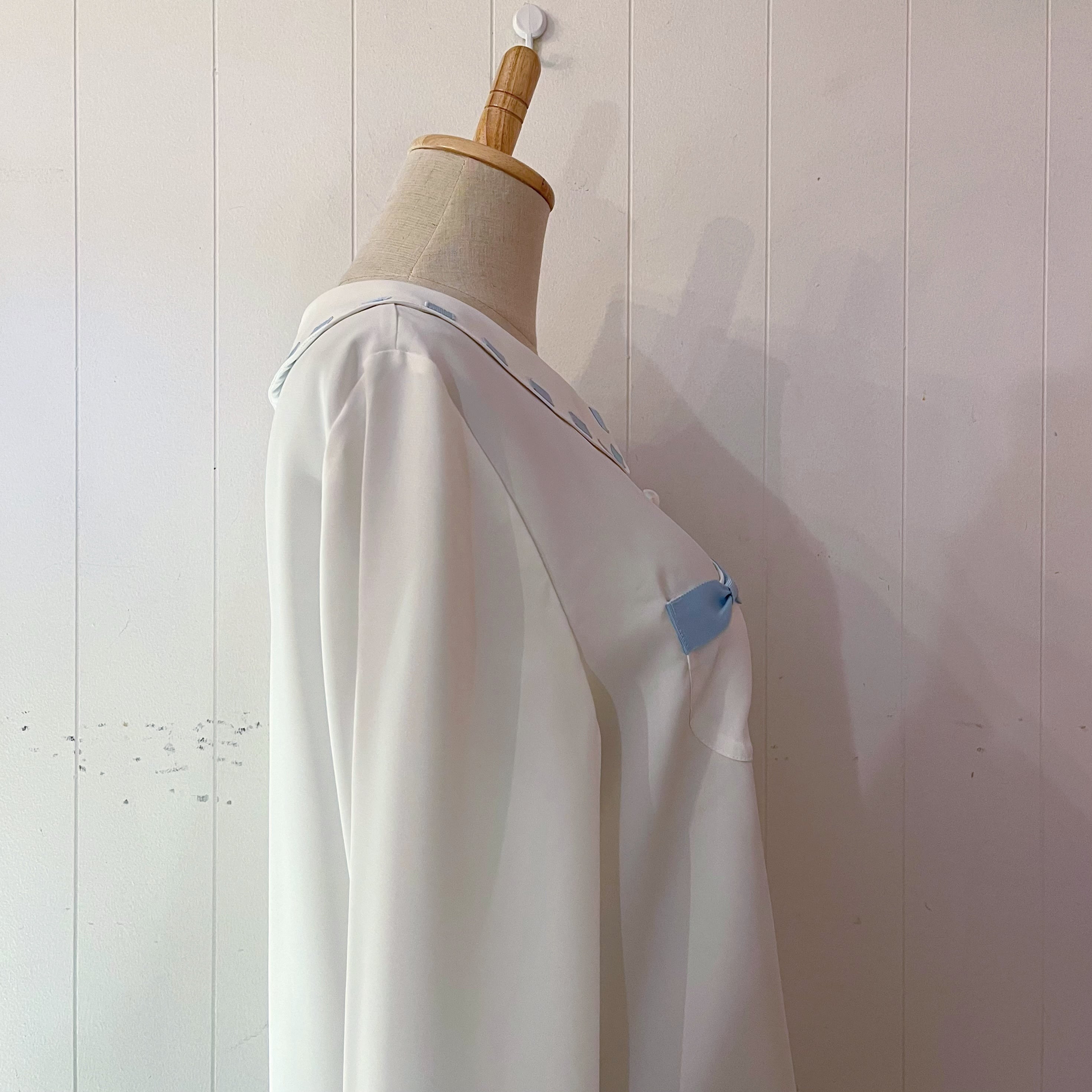 light blue ribbon white blouse