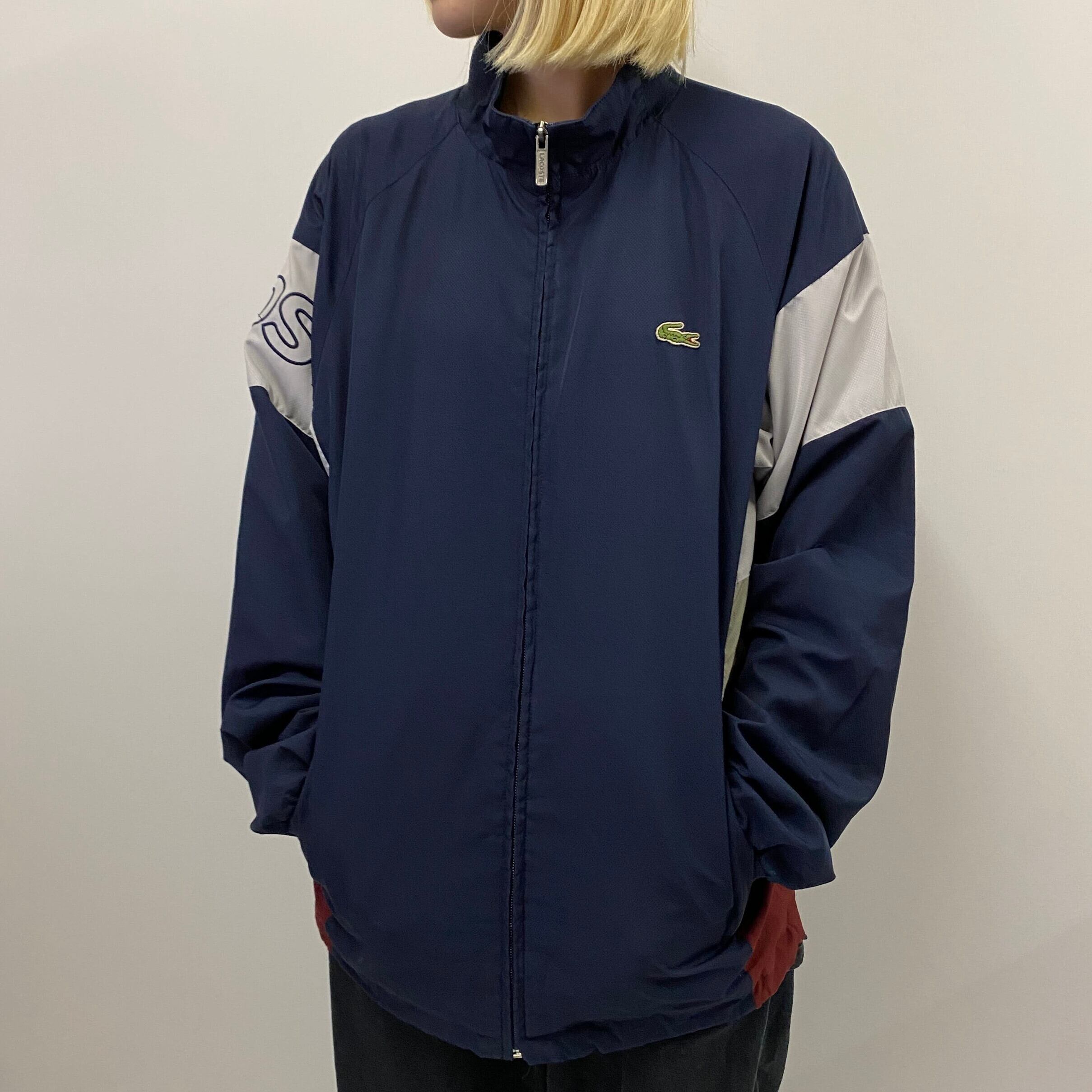 DEVANLAY社製 LACOSTE ラコステ ロゴ刺? ジャージ スポーツジャケット メンズL相当 古着 ネイビー×レッド×ベージュ×ホワイト  袖刺繍【ジャージ・トラックジャケット】【HA10】【CS2301-40】【3anniv】 | cave 古着屋【公式】古着通販サイト