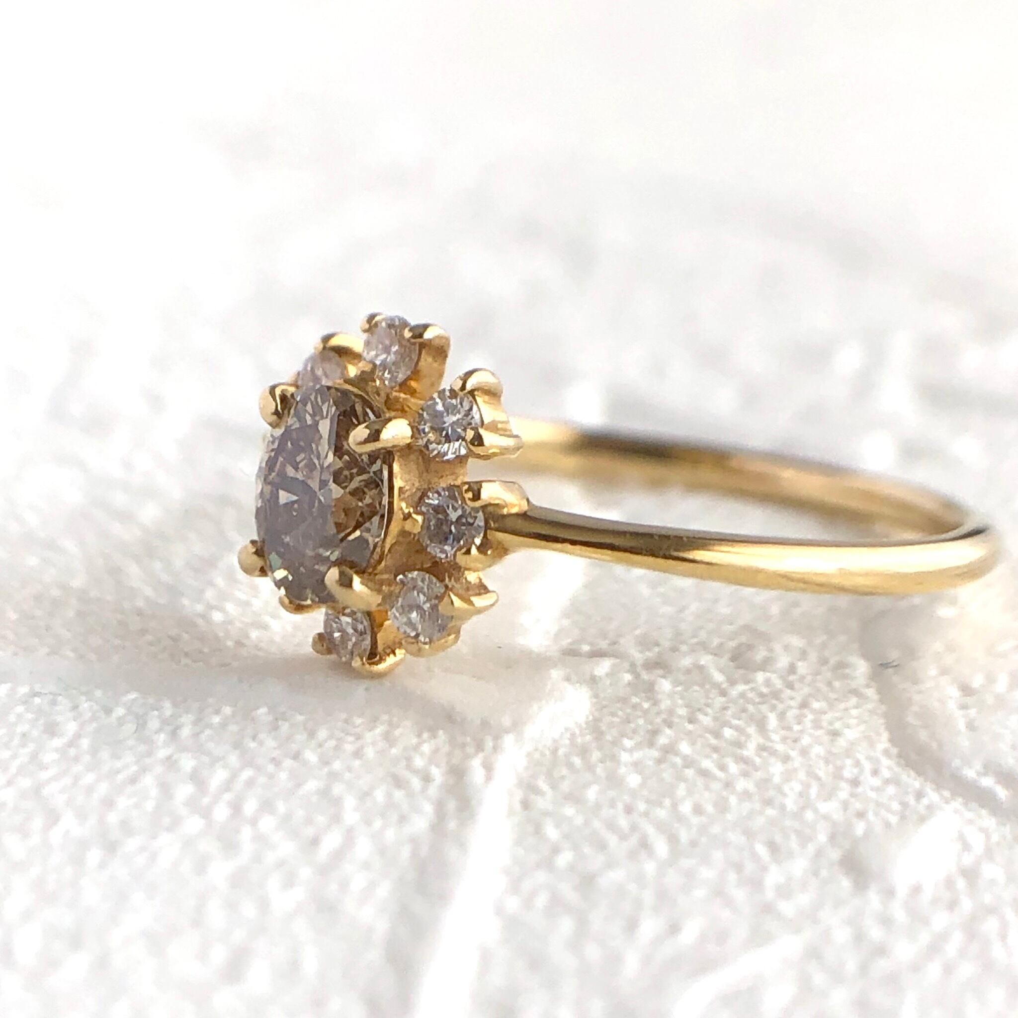 フラワーモチーフ ベリーライトブラウン オーバルカット ダイヤモンド  