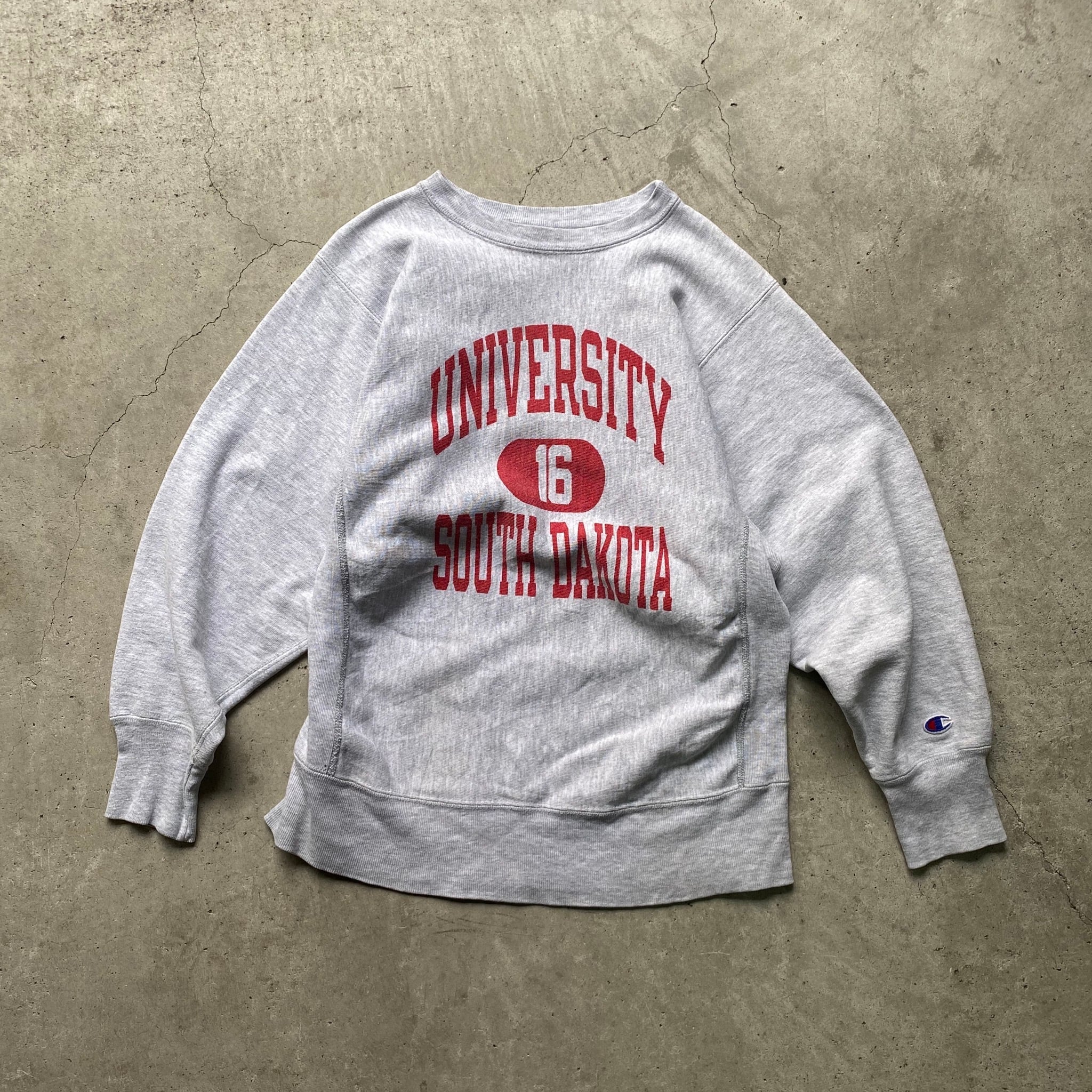 80年代 ビンテージ トリコタグ Champion チャンピオン REVERSE WEAVE リバースウィーブ UNIVERSITY  SOUTHDAKOTA サウスダコタ大学 16 ナンバリング 染み込みプリント 3段プリント アーチ カレッジスウェット トレーナー 80s  ヴィンテージ