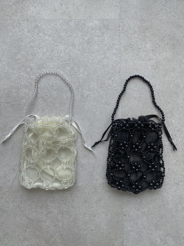 hole arrange beads hand bag