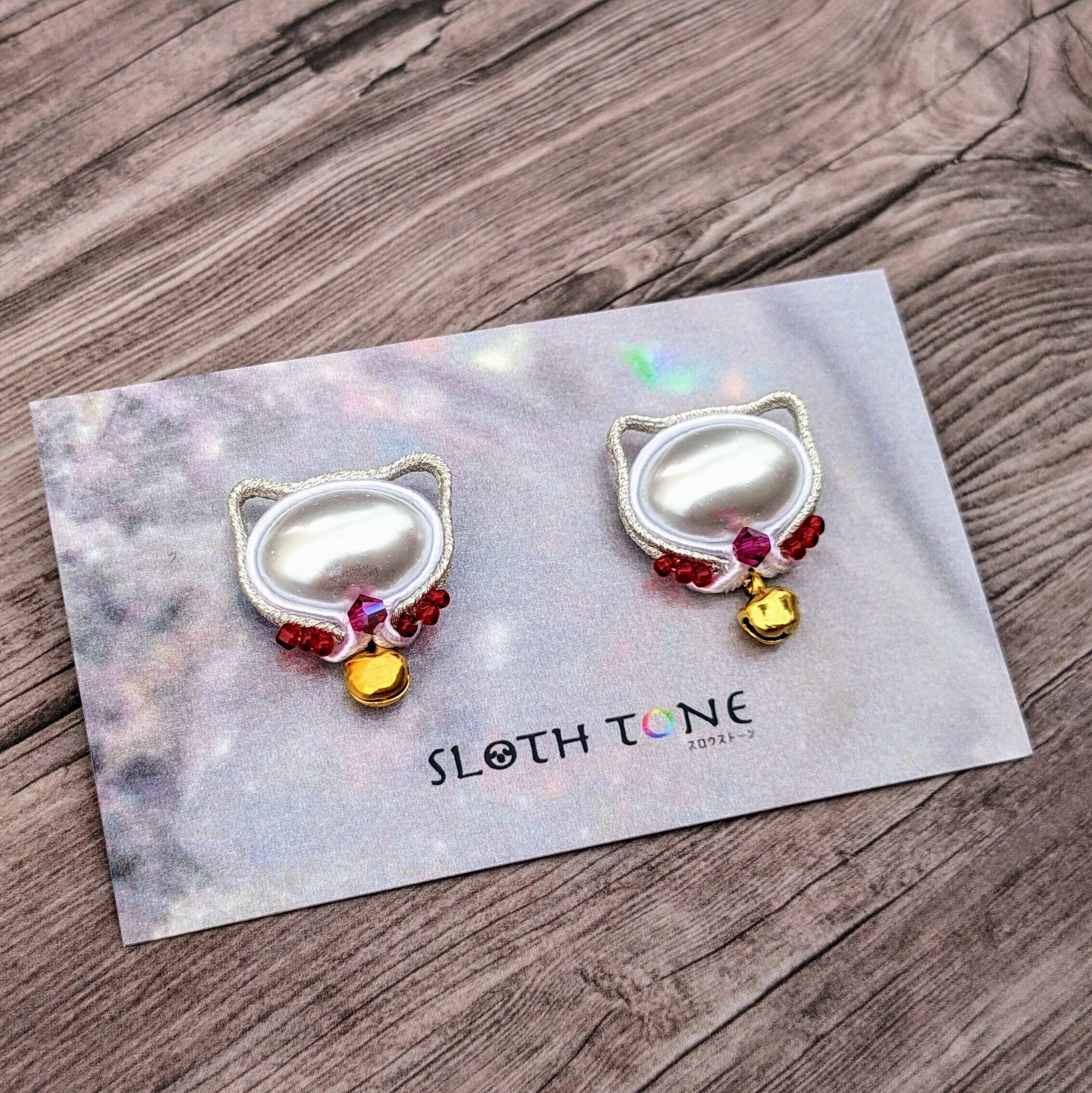 黒と金のソウタシエの耳飾り | slothtone