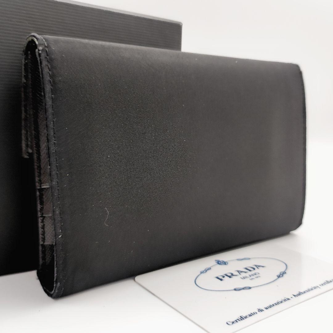 ✨新品未使用・箱保証書付き✨PRADA 長財布ナイロン三角プレート黒色