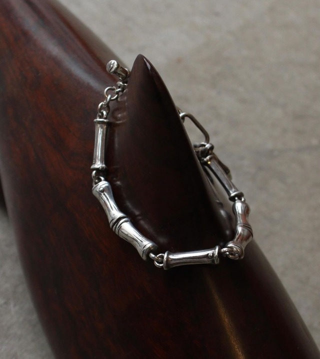 old bamboo silver bracelet with charm .  size 21-18.5cm .