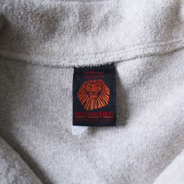 "THE LION KING" one point embroidery over silhouette half-zip fleece pullover