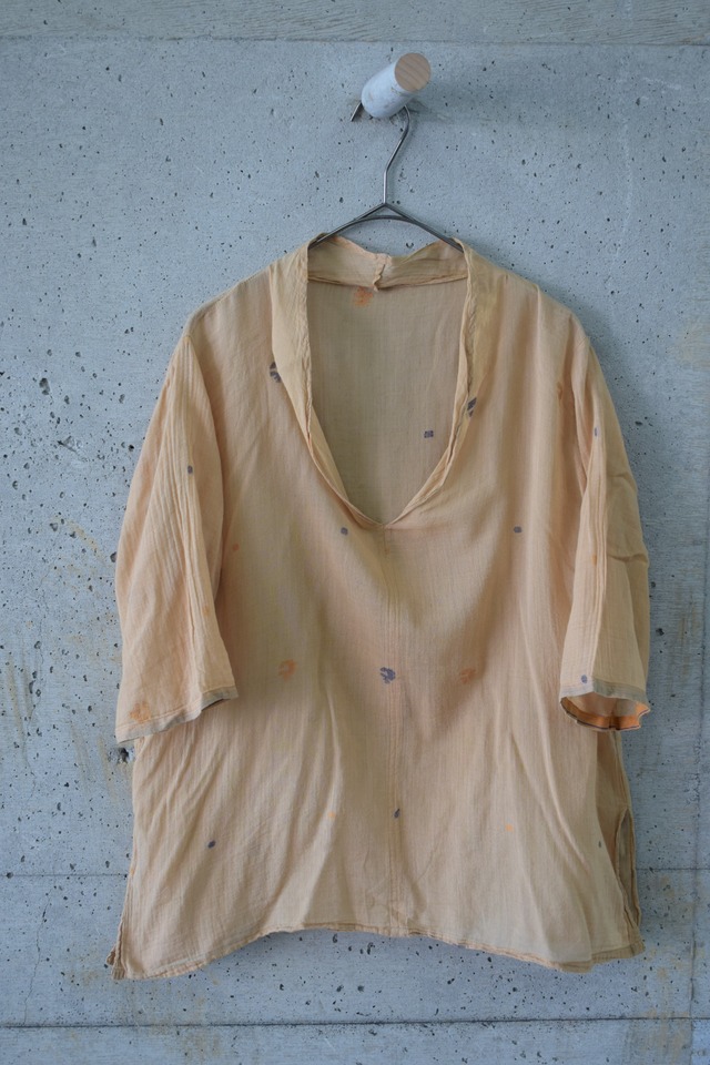 White shirt with tucks