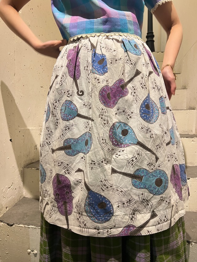 50's vintage Musical instrument pattern apron