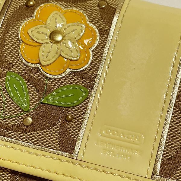 新品・最新作 コーチ 財布 二つ折り イエロー 花柄 フローラル COACH