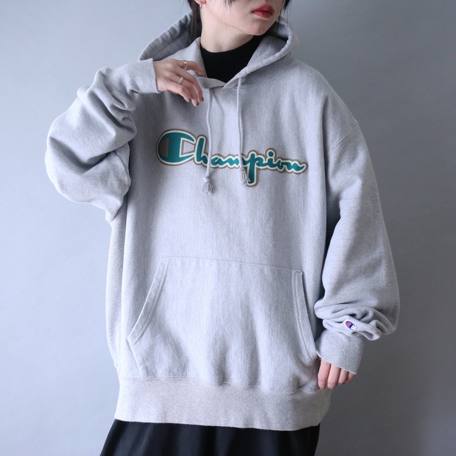 "Champion" front logo design over silhouette reverse wave sweat parka