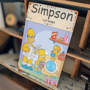 ♡HAPPYなワンシーン♡送料無料!ちょうどいいブリキ看板【 The Simpsons ( シンプソンズ )】『 LAUNDRY ランドリー 』 METAL SIGN / メタルサイン / ブリキ看板 / サインボード / ビンテージ加工 〚アメリカン雑貨 アメトイ〛