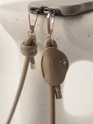 asymmetry tag（beige/long）