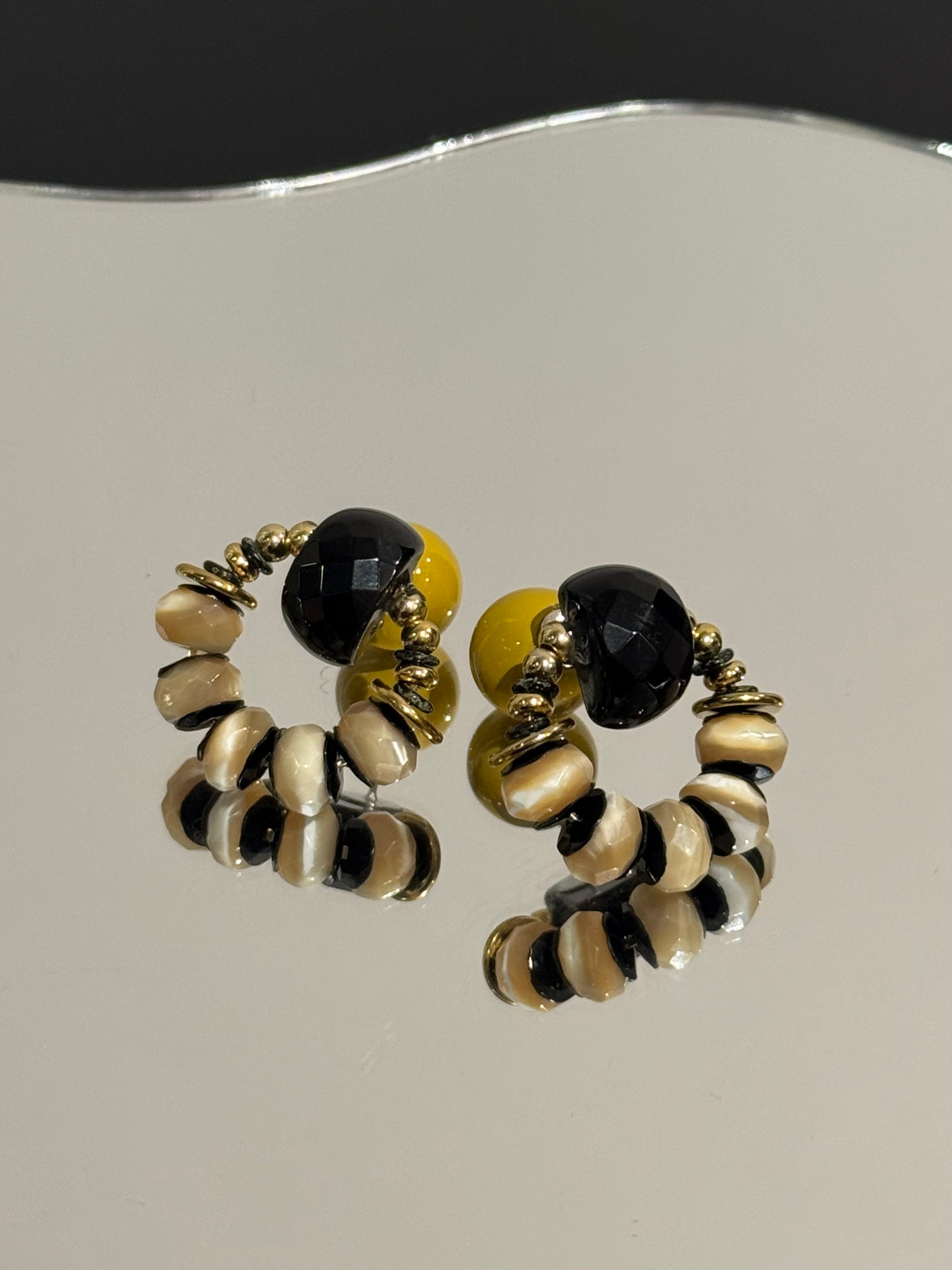black amber stripe gold circle
