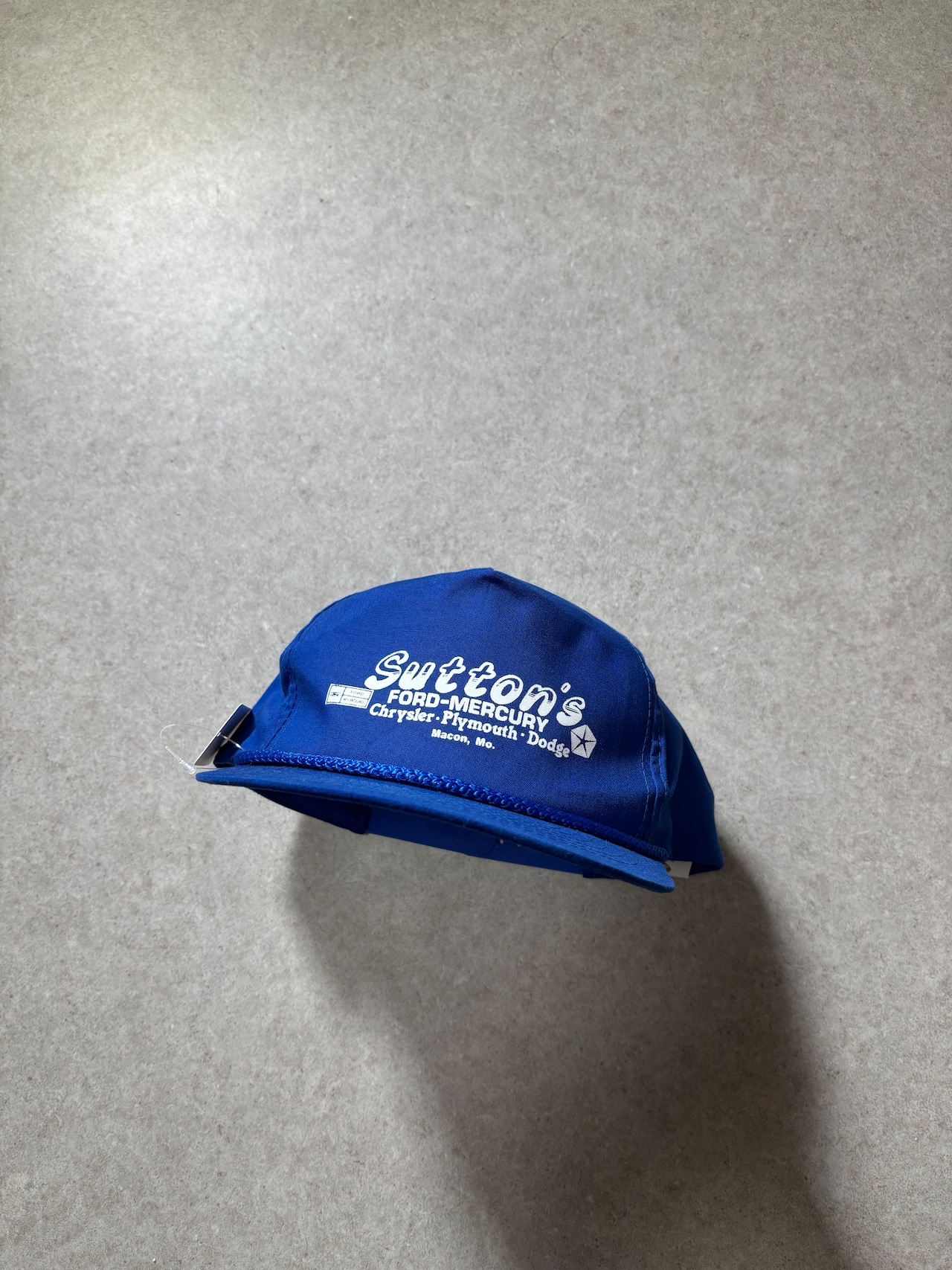 Car dealer tracker cap