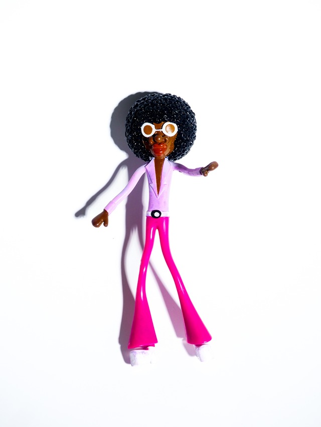 Wiggly Afro-Haired Doll Toy