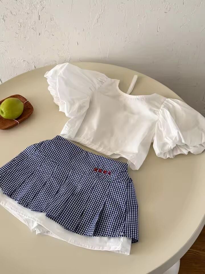 ×××刺繍ブルーチェックスカート