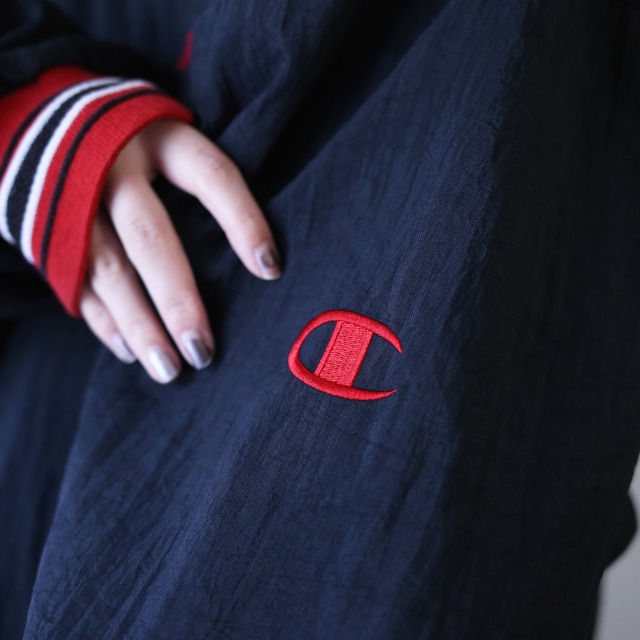 "Champion" over silhouette  nylon pullover